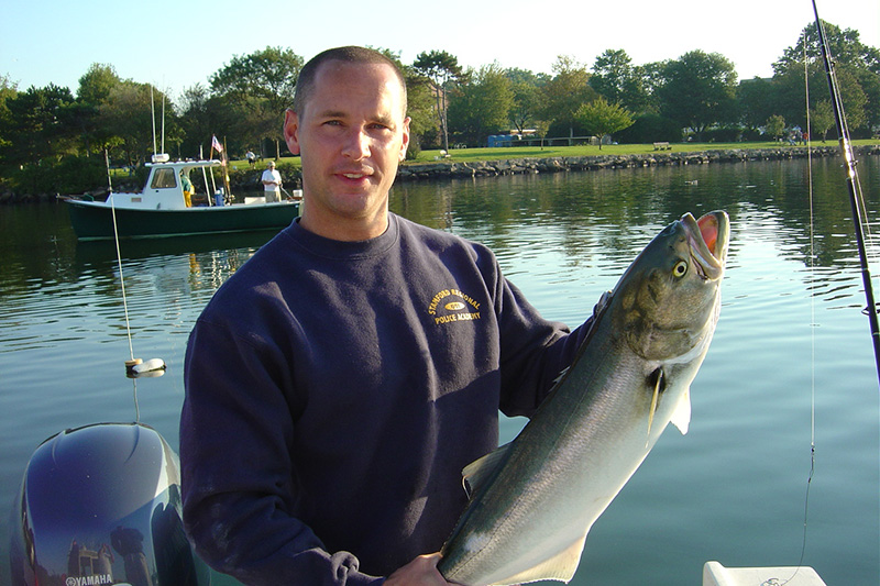 Fishing Charters Man Showing Off His Catch of the Day